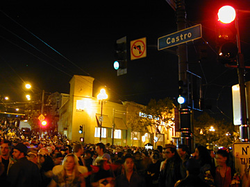 Market  & Castro 11:35 10/31/01 - This is the scene at Market and Castro at 11:35pm, full moon Halloween.... CRAZY!