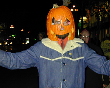 Pumpkin Head - Pumpkin head walking the streets.