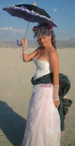 Beauty with pickable pockets - I found a packet of sensual lubricant one of her pockets.  Burning Man 2001. To edit, email editor@costumenetwork.com