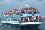 The Arrival - Cherry Grove residents invading the Pines' Harbor for the annual Fire Island Invasion... July 4th, 2002