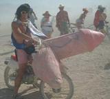Elvis & his dick bike - Burning Man 2001. To edit, e-mail Editor@CostumeNetwork.com